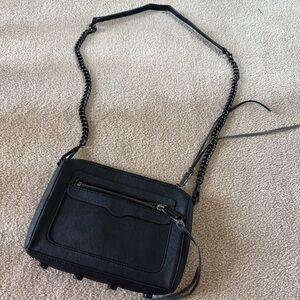 Black Crossbody Bag with Adjustable Strap and Textured Fabric